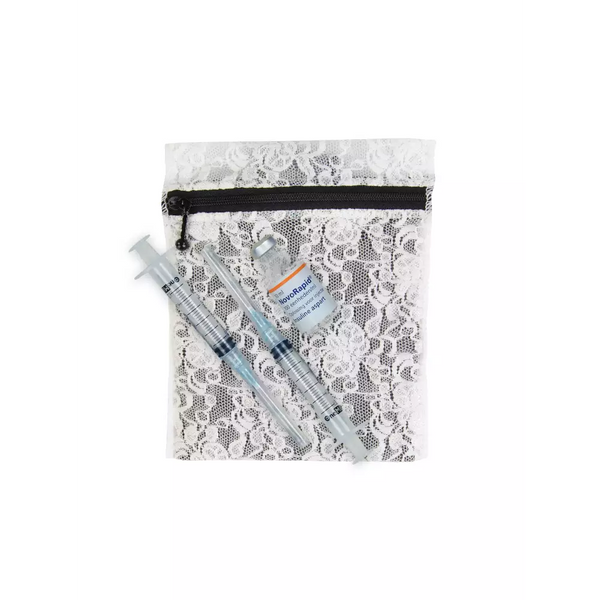Insulin cooling wallet in lace design, holding insulin vials and syringes.