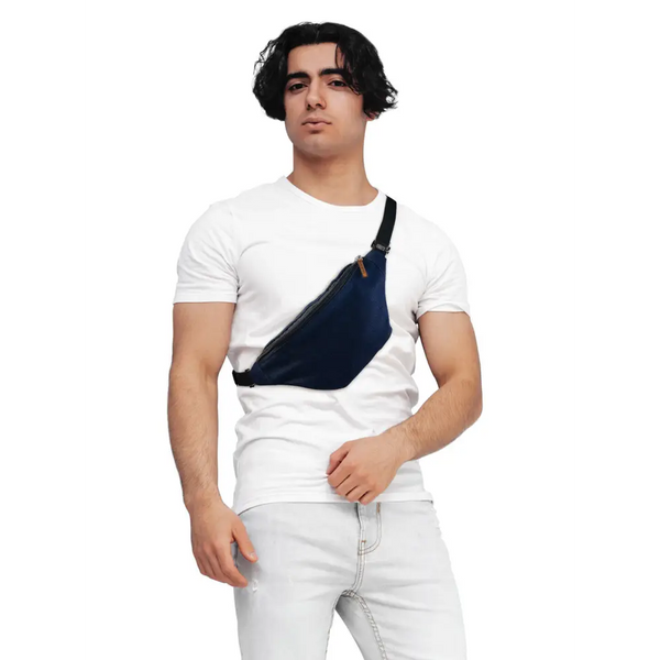Navy blue Dia-Fanny Pack worn diagonally over a white t-shirt for diabetic supplies