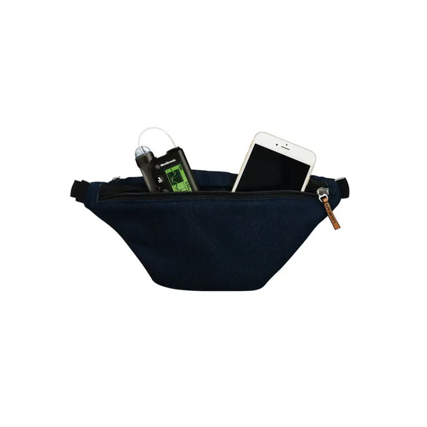 Navy blue Dia-Fanny Pack featuring diabetic supplies and essentials visible inside