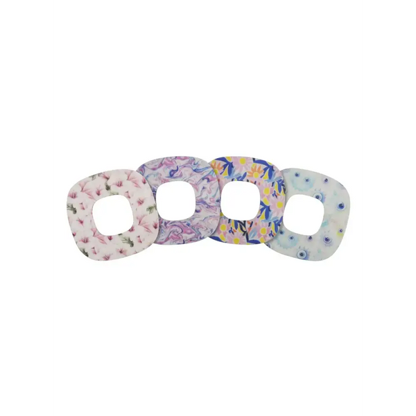 Colorful Simplera sensor patches for Medtronic, secure and breathable.