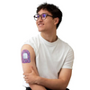 Omnipod Dash Patch with vibrant spring design applied on male arm.