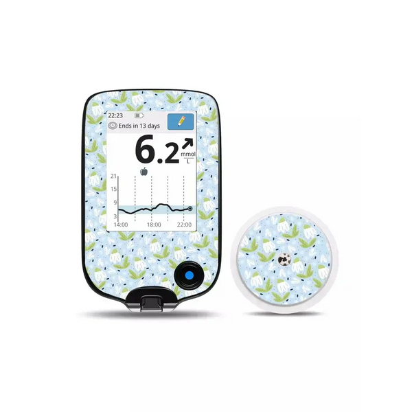 Freestyle Libre Reader and Sensor with Spring Edition floral stickers.