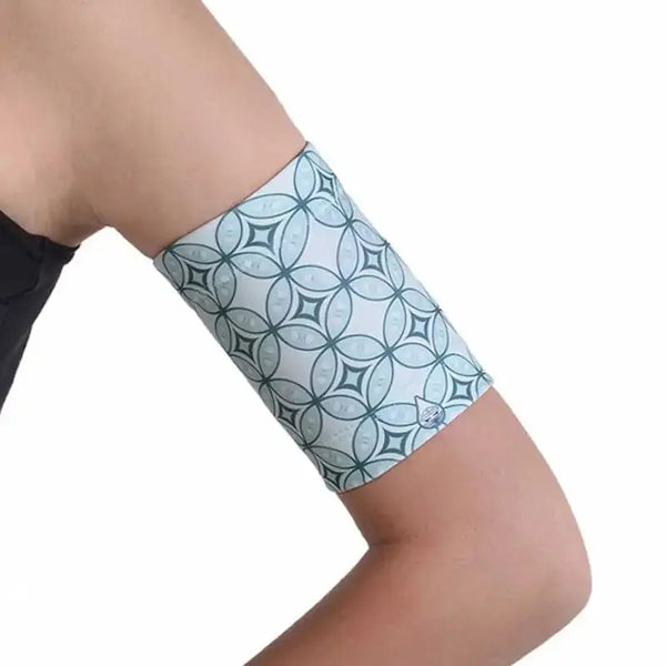 Trendy CGM arm band for glucose sensor and insulin pump in retro design.