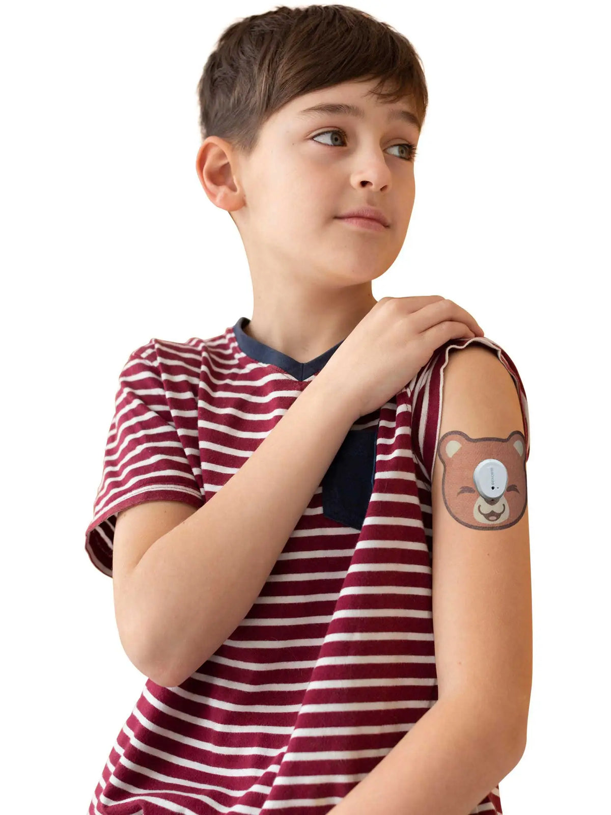 Patch adhésif enfant Dexcom G7, forme ourson, porté par un jeune garçon