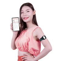 Buzud CGM Adjustable Armband - Dia-Style worn by user with smartphone display.