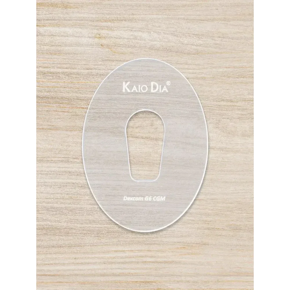 CGM Sensor Patch Template Kaio-Patch on wooden background.