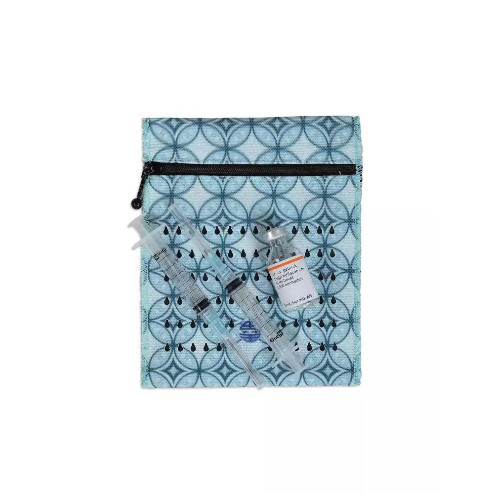 Dia-Cool insulin travel case cooling wallet for 4 insulin vials or eye drops in blue patterned fabric with zipper closure
