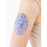Patch adhésif Dexcom G6, série Spring, sur le bras, gros plan