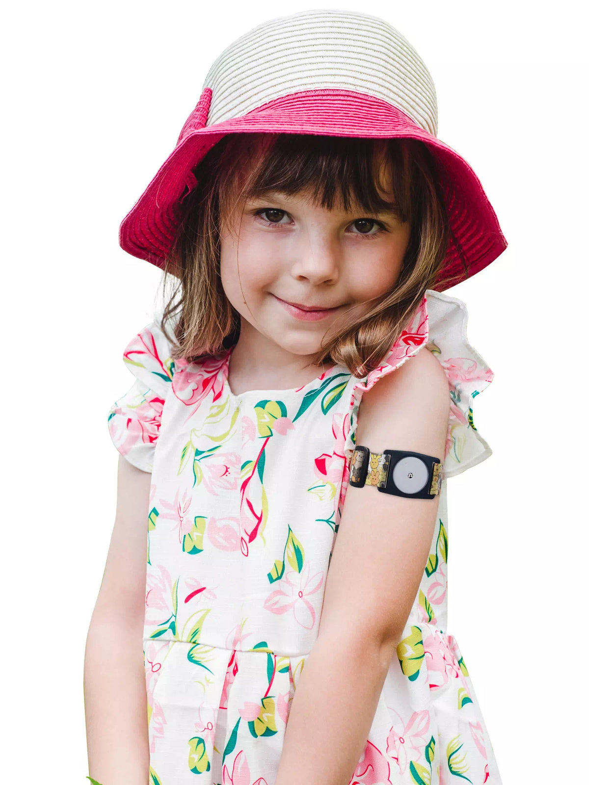 Child wearing Dia-Style Kiddy Libre 2 Armband with floral dress and hat.
