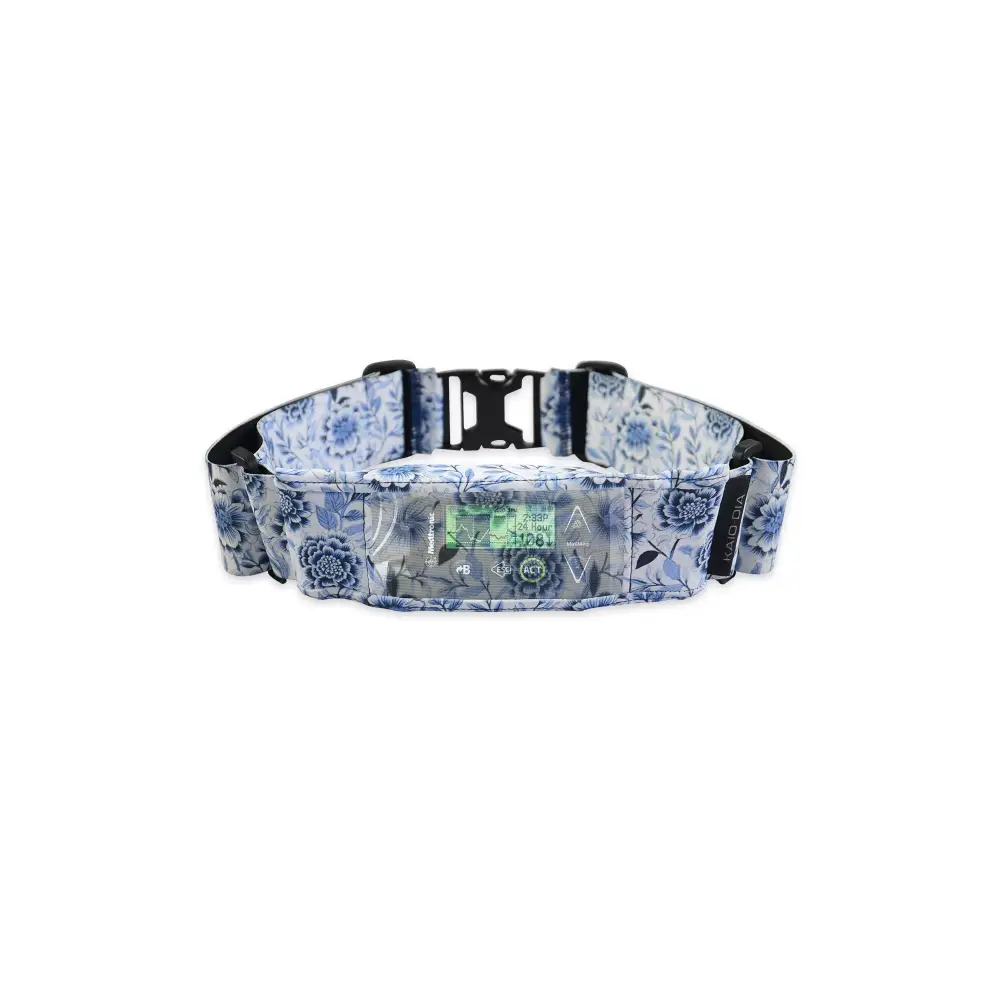 Insulin pump belt with window in blue floral design.