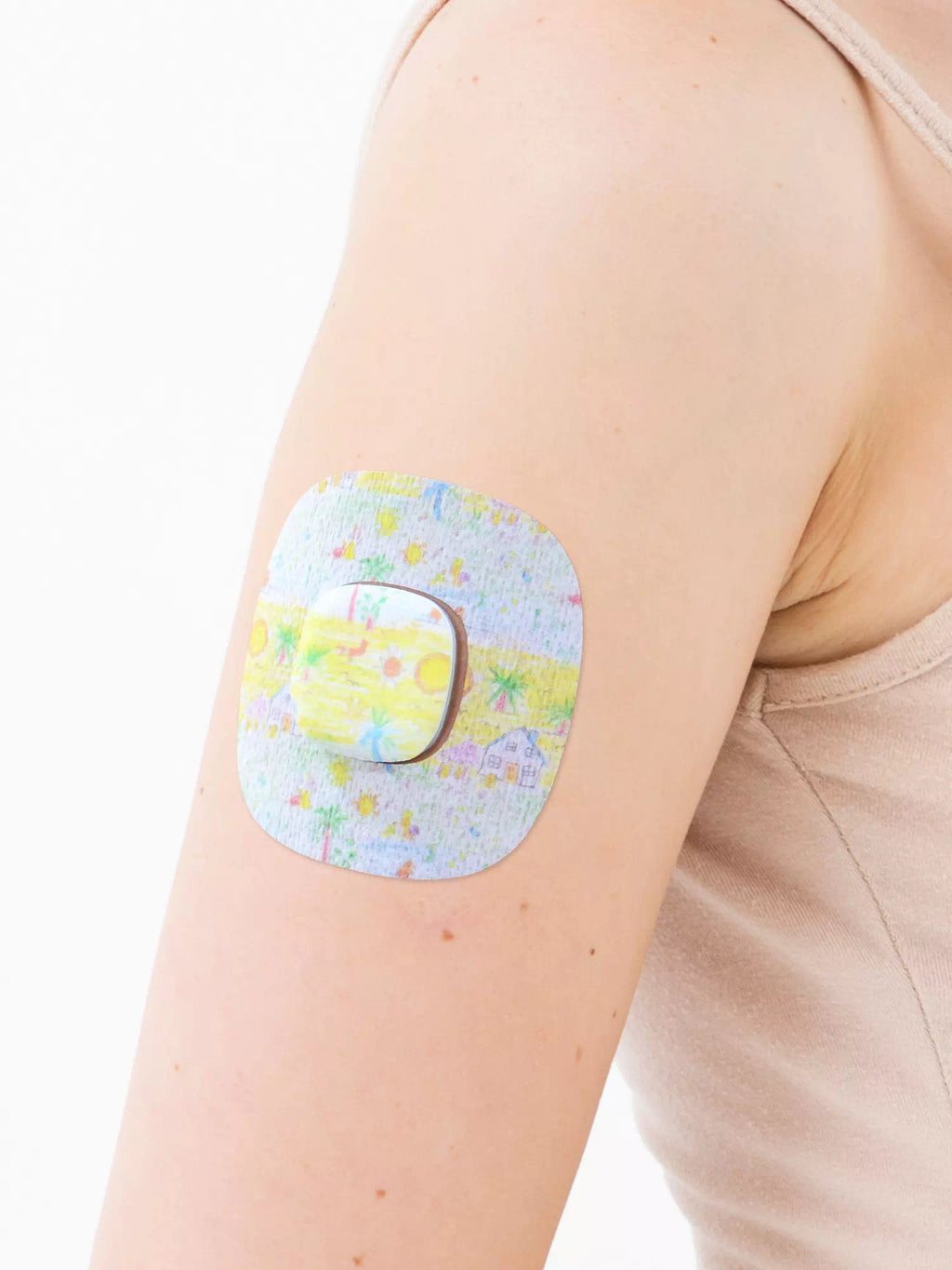 Patch adhésif Simplera Sync, motif Childhood Memories, sur le bras