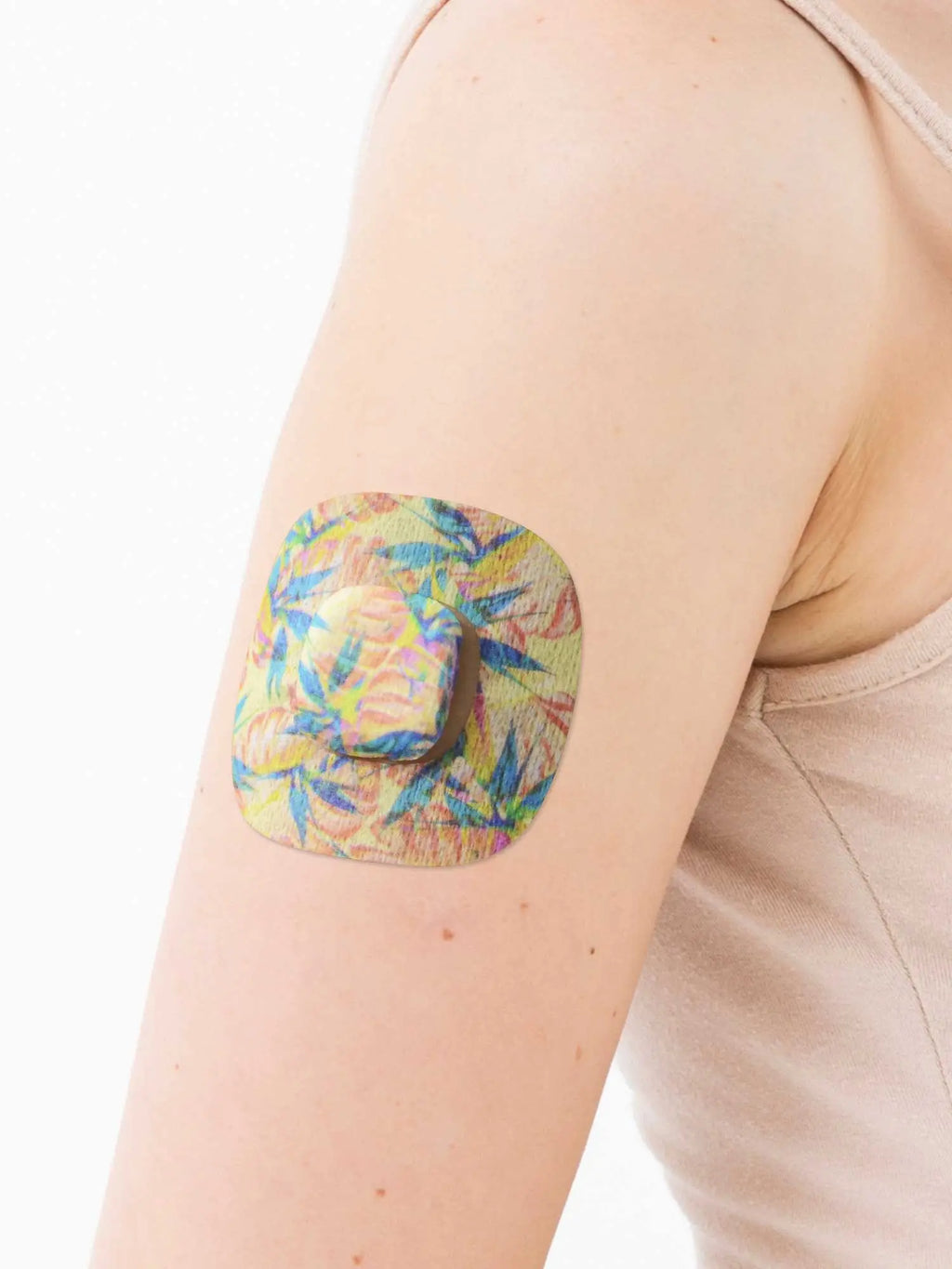 Patch adhésif Simplera Sync, motif Tequila Sunrise, sur le bras