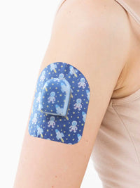 Patch adhésif pour pod Omnipod, motif Astronaut, sur le bras