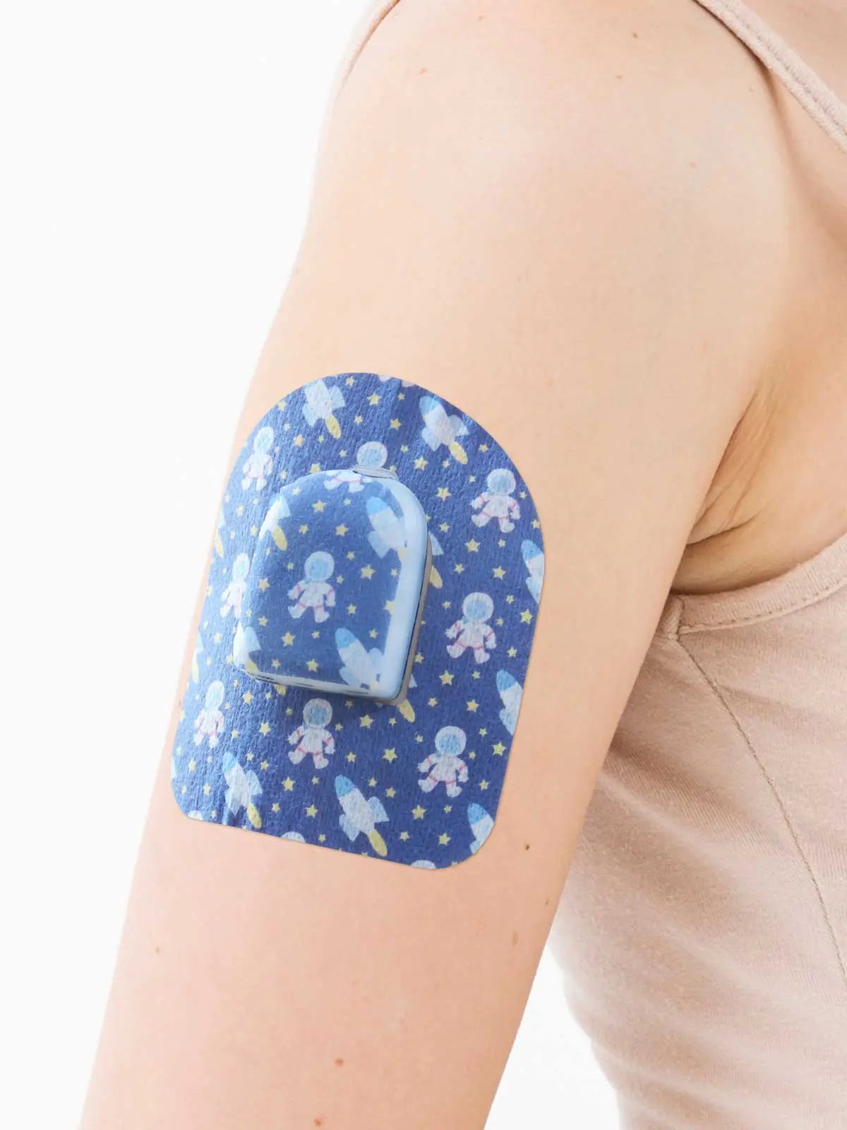 Patch adhésif pour pod Omnipod, motif Astronaut, sur le bras