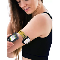 Armband for Omnipod insulin patch pump on woman's upper arm, showcasing adjustable Dia-Style design for active lifestyles.