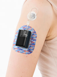 Patch adhésif Tandem Mobi, motif Flow Camo, sur le Dia-Mobi Clip au bras