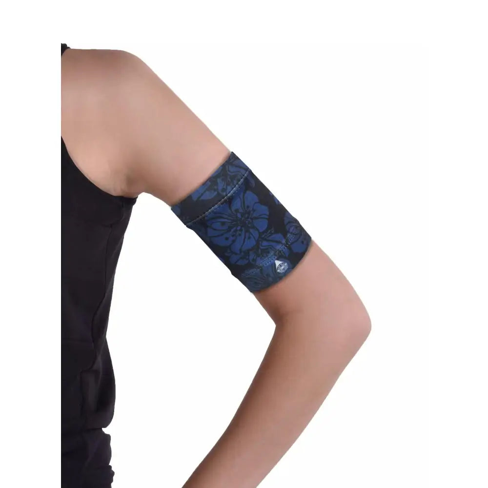 Stylish blood glucose sensor armband in midnight blue design for diabetes management.