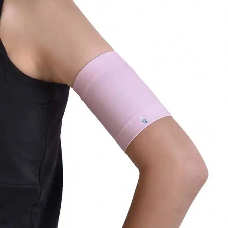 Children blood glucose sensor armband in pink, designed to hold a glucose sensor securely and comfortably for active kids.