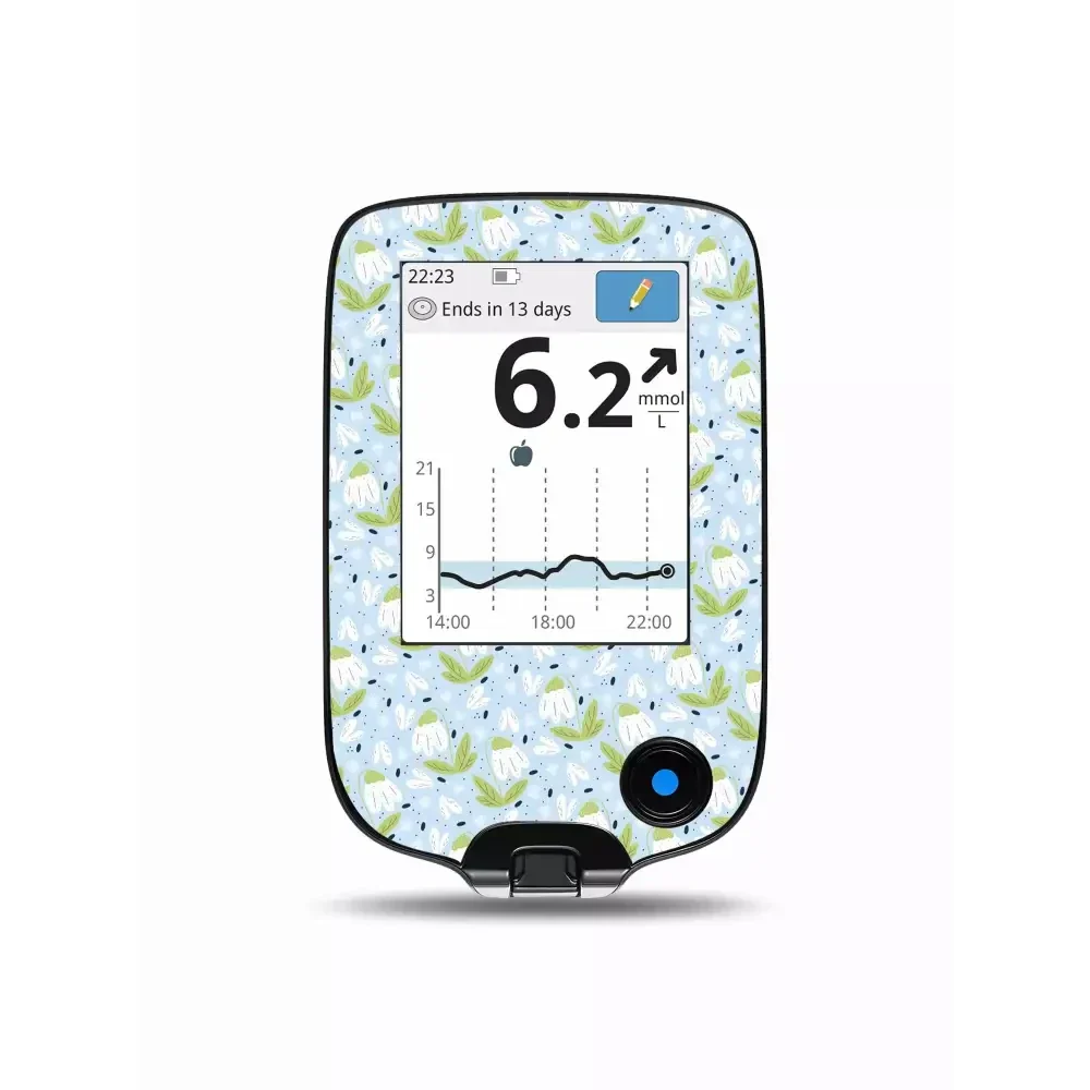 Freestyle Libre Reader with floral spring-themed sticker.