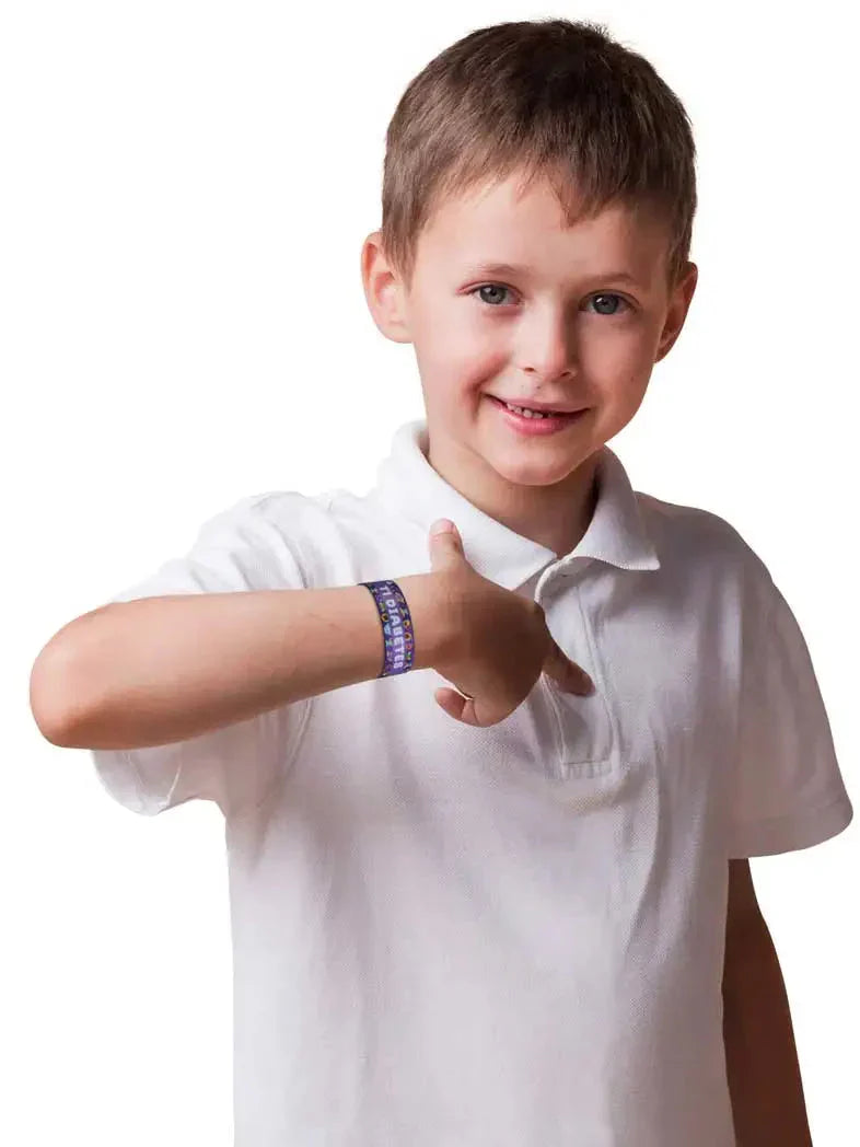 Child wearing Kaio-Wristband reversible Type 1 Diabetes awareness wristband.