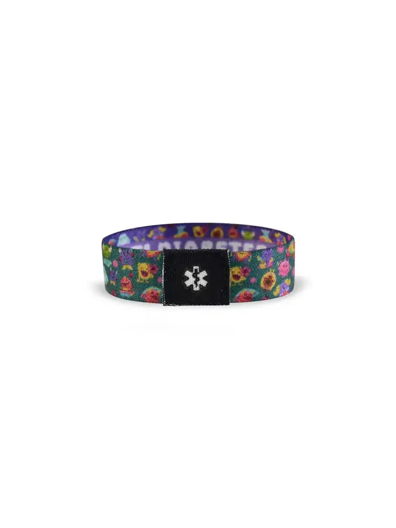 Reversible children's diabetes awareness wristband with colorful prints and "T1 Diabetes" text.