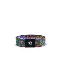 Reversible children's diabetes awareness wristband with colorful prints and "T1 Diabetes" text.