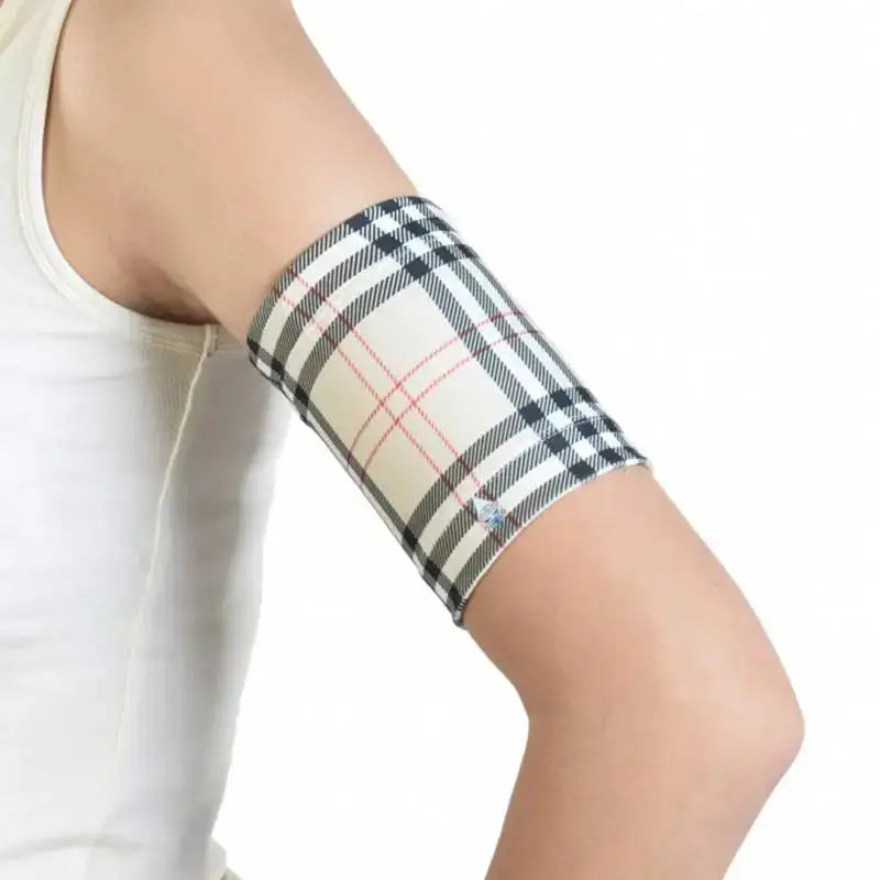 CGM arm band with retro and trendy plaid design for glucose sensor support.