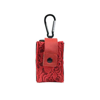 Red lace insulin pump pouch with carabiner clip for versatile attachment.