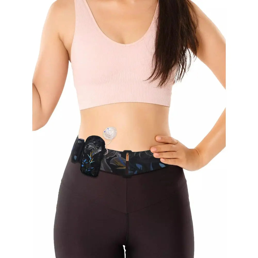 Vertical insulin pump case on model with belt, designed for multiple pump brands, featuring stylish prints and temperature control.